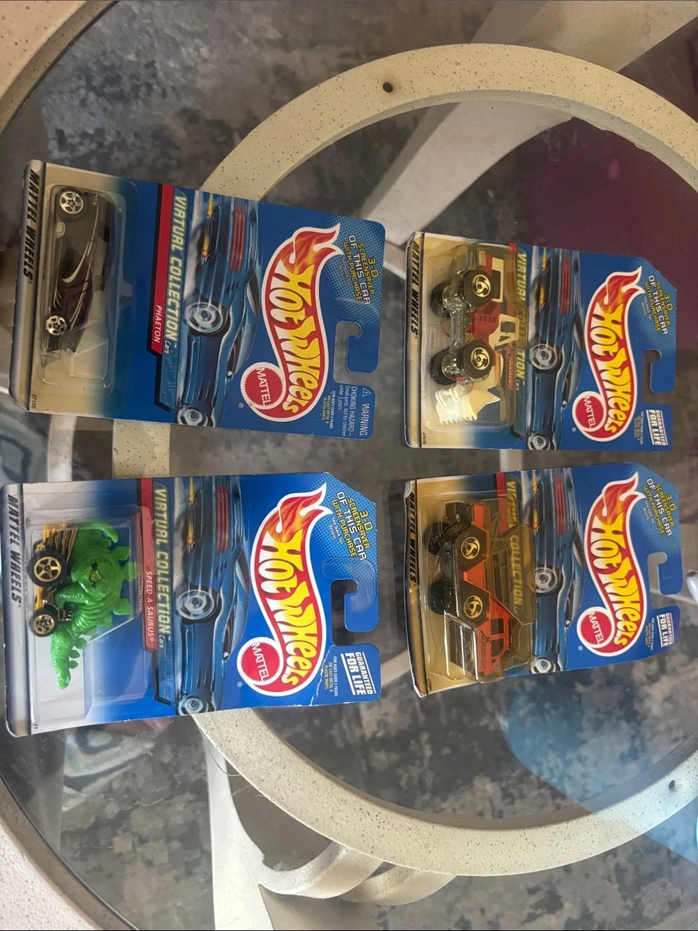 4 Vintage Hot Wheels Cars. Spinosaurus, Phaeton, wheel loader, flame stopper